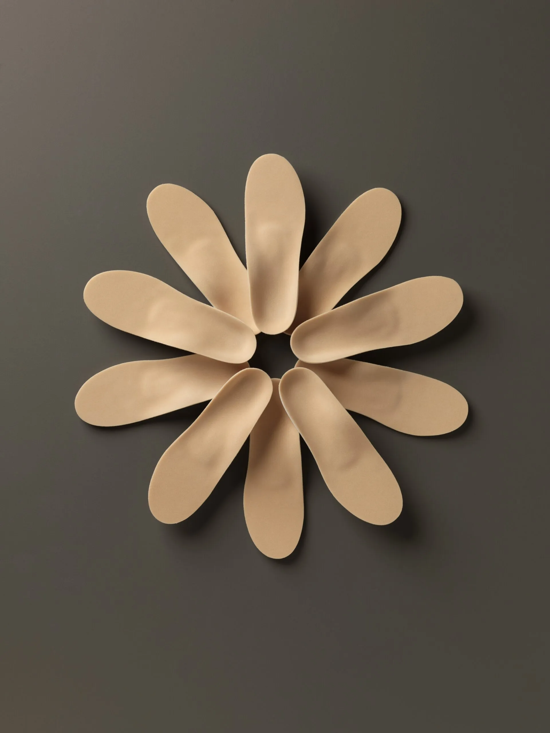 Amfit custom diabetic insoles arranged in a flower pattern