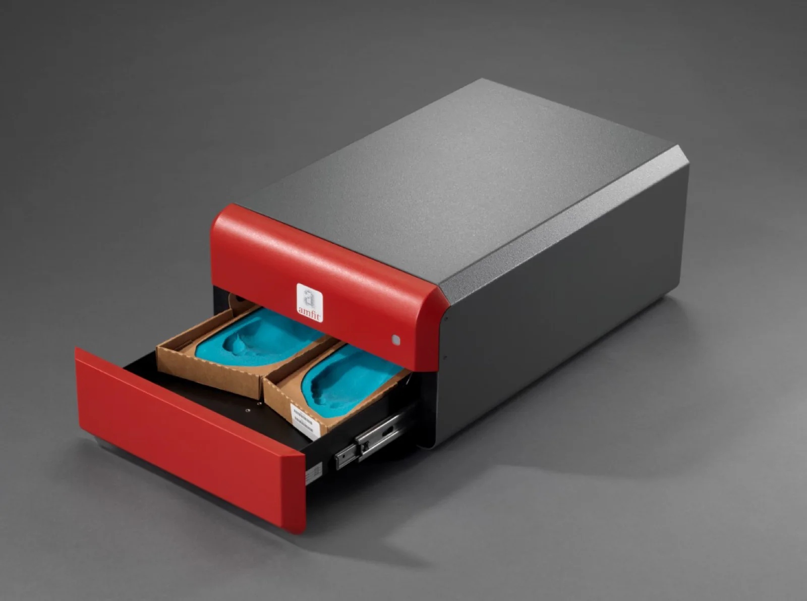 Amfit Impress Scanner with drawer open showing two foam impressions