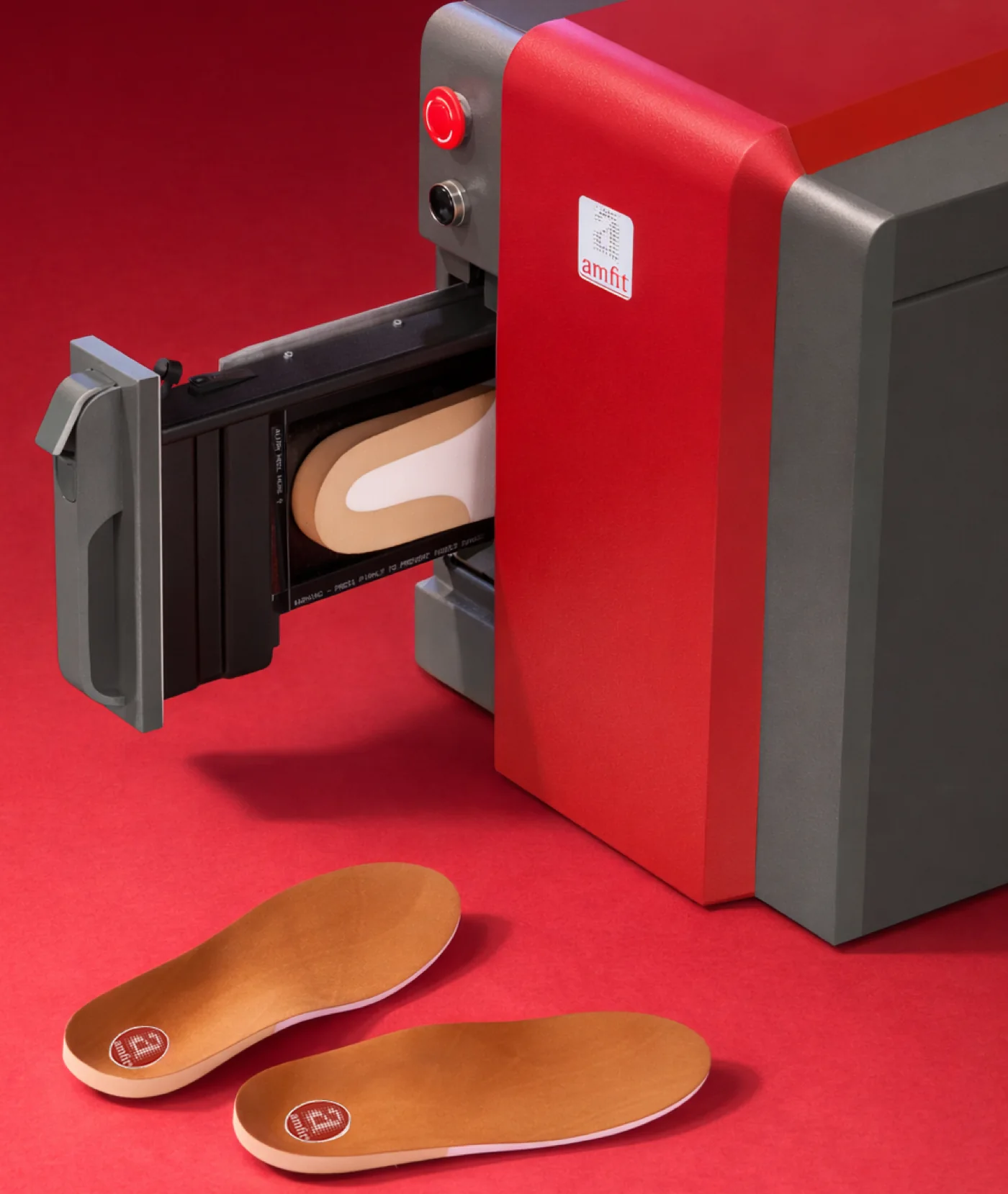 Amfit CAD/CAM Mill with a finished custom insole, in-clinic orthotic fabrication